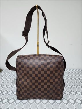 Authentic This authentic LOUIS VUITTON Damier Canvas Naviglio Messenger Bag Brow